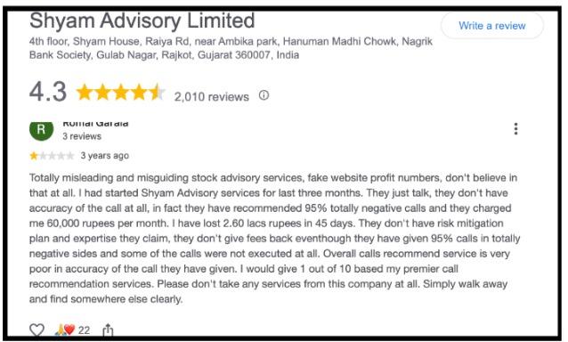 Google review describing delayed trade entries and a push to upgrade to a premium plan